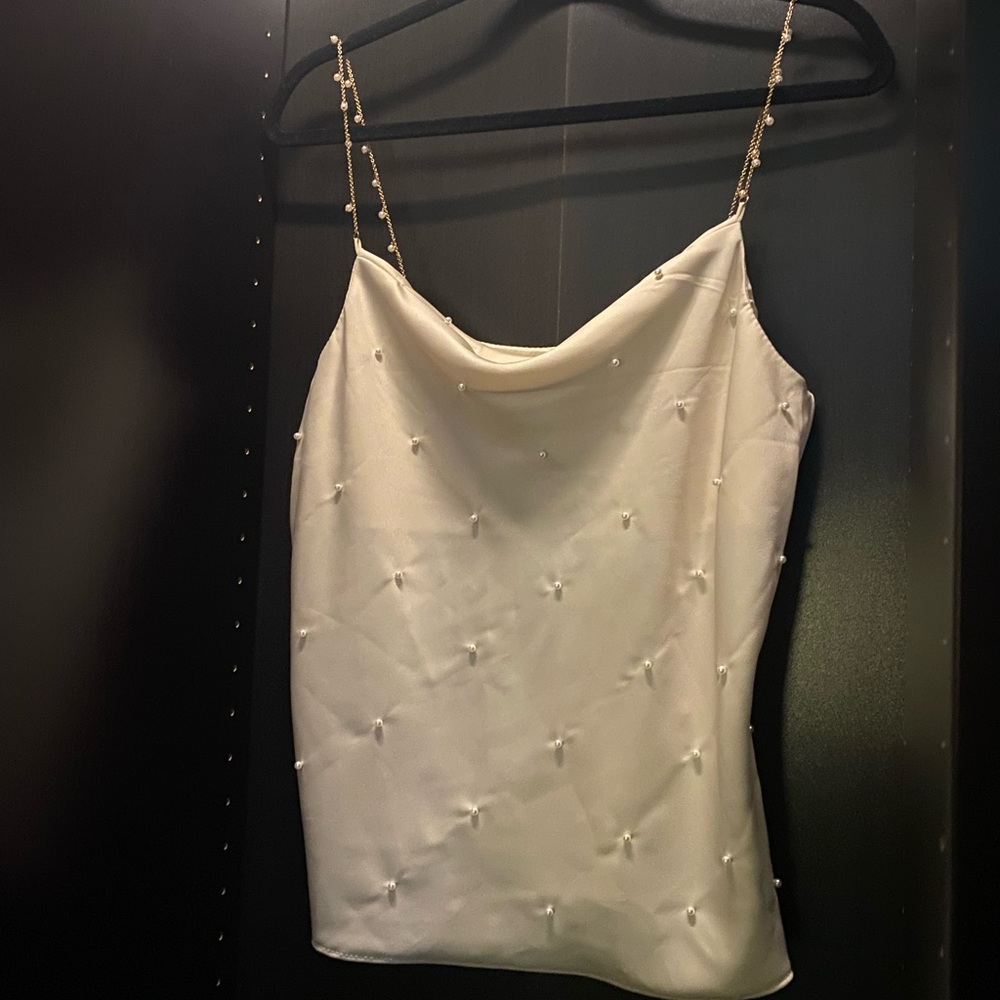 DO + BE off white satin top with pearl detailing and chain straps